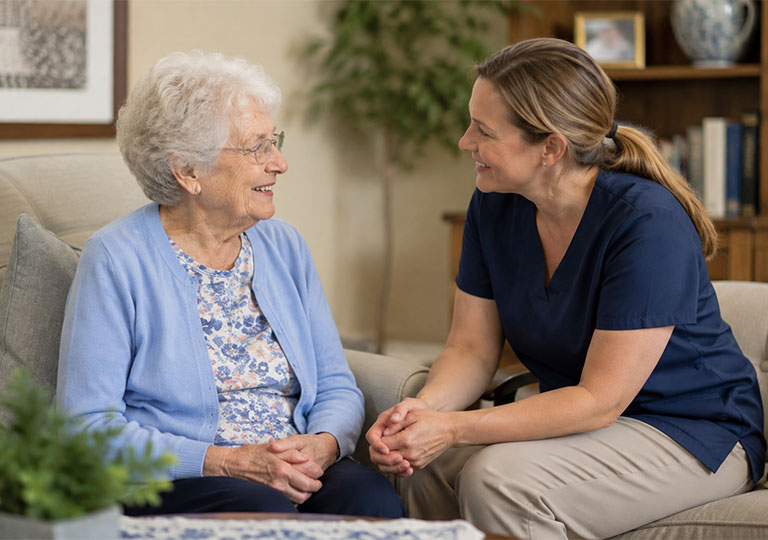 Caregiver engaging one-on-one with a resident as part of the Soul Purpose program at American Orchards